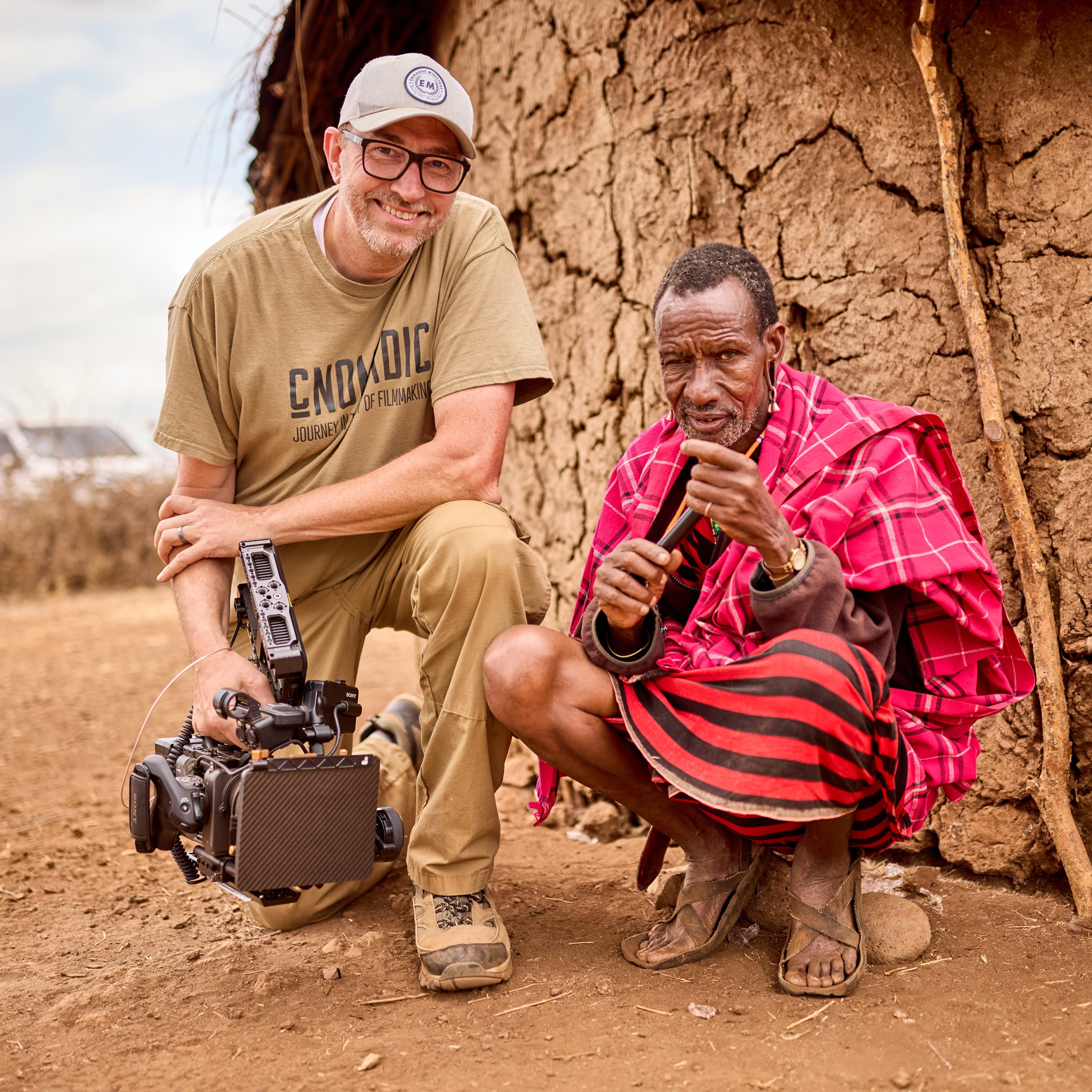 Filmmaker Chris Tinard with a Maasai elder during production in Kenya
